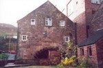 The whater-wheel side, of the mill at Leek - Dec 2001.